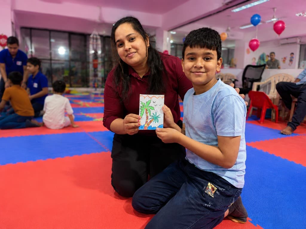 Children celebrating achievement during KidsSportsWorld Annual Sports Day